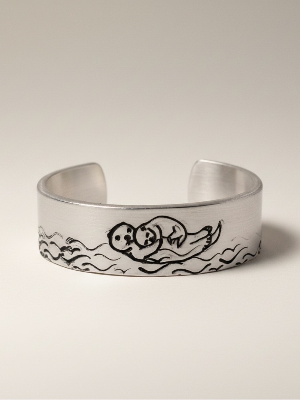 Handmade stamped silver‎ adjustable hypoallergenic ring with Otter & baby Design
